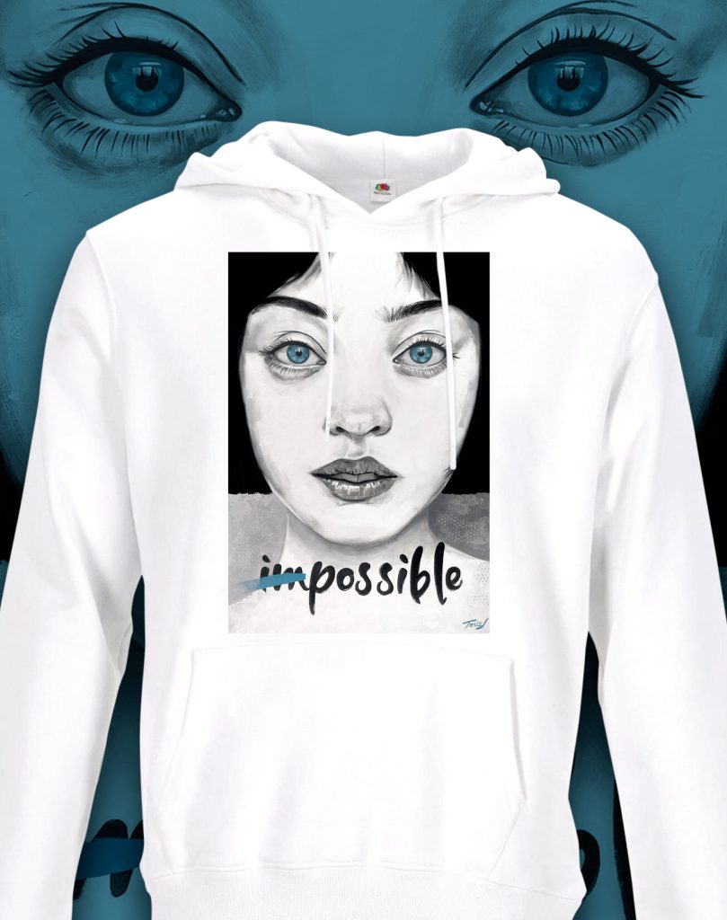 Hoodie featuring Jaume Tenes’ artwork with the message ‘Turn the impossible into possible,’ symbolizing creativity, determination, and self-expression.