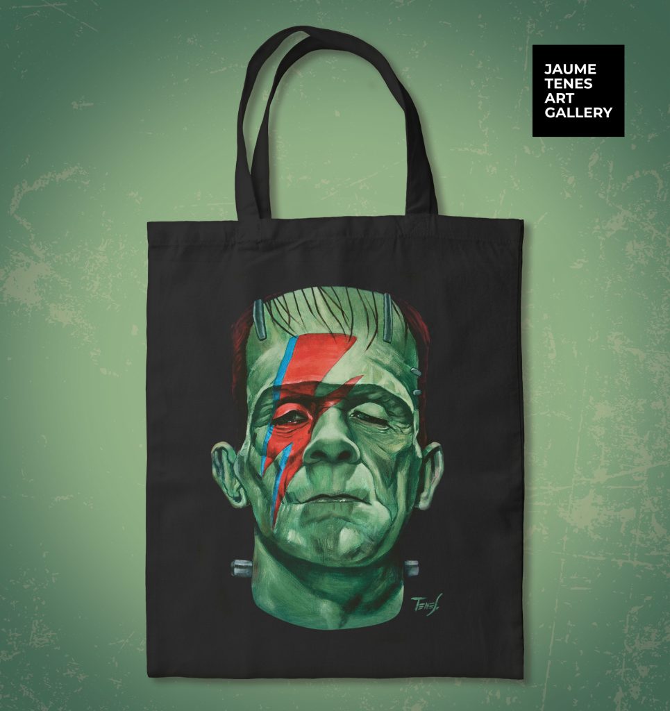 Tote bag featuring a bold artistic portrait of Frankenstein fused with David Bowie by Jaume Tenes, reimagined as wearable art.